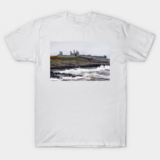 Rough waves battering the coast near Dustanburgh castle Northumberland, UK T-Shirt